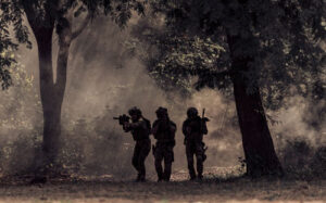 Team of soldiers in the forest