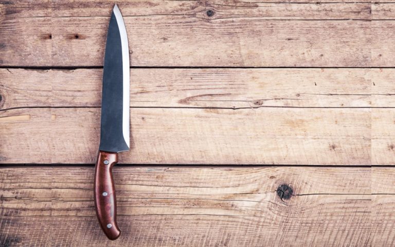 Brown knife on an old kitchen. cooking